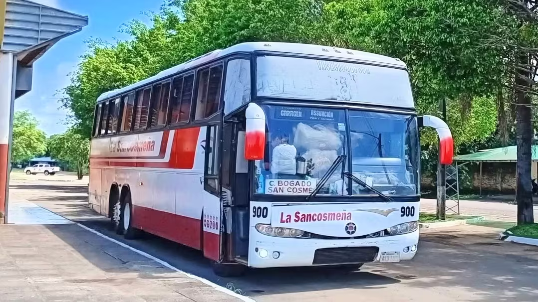 La Sancosmeña bus parked at Coronel Bogado terminal in Paraguay